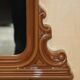 Vintage Art Deco decorative mirror with a thick frame.