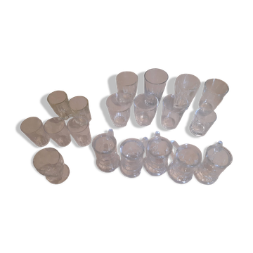 Set of 21 mismatched small glasses.