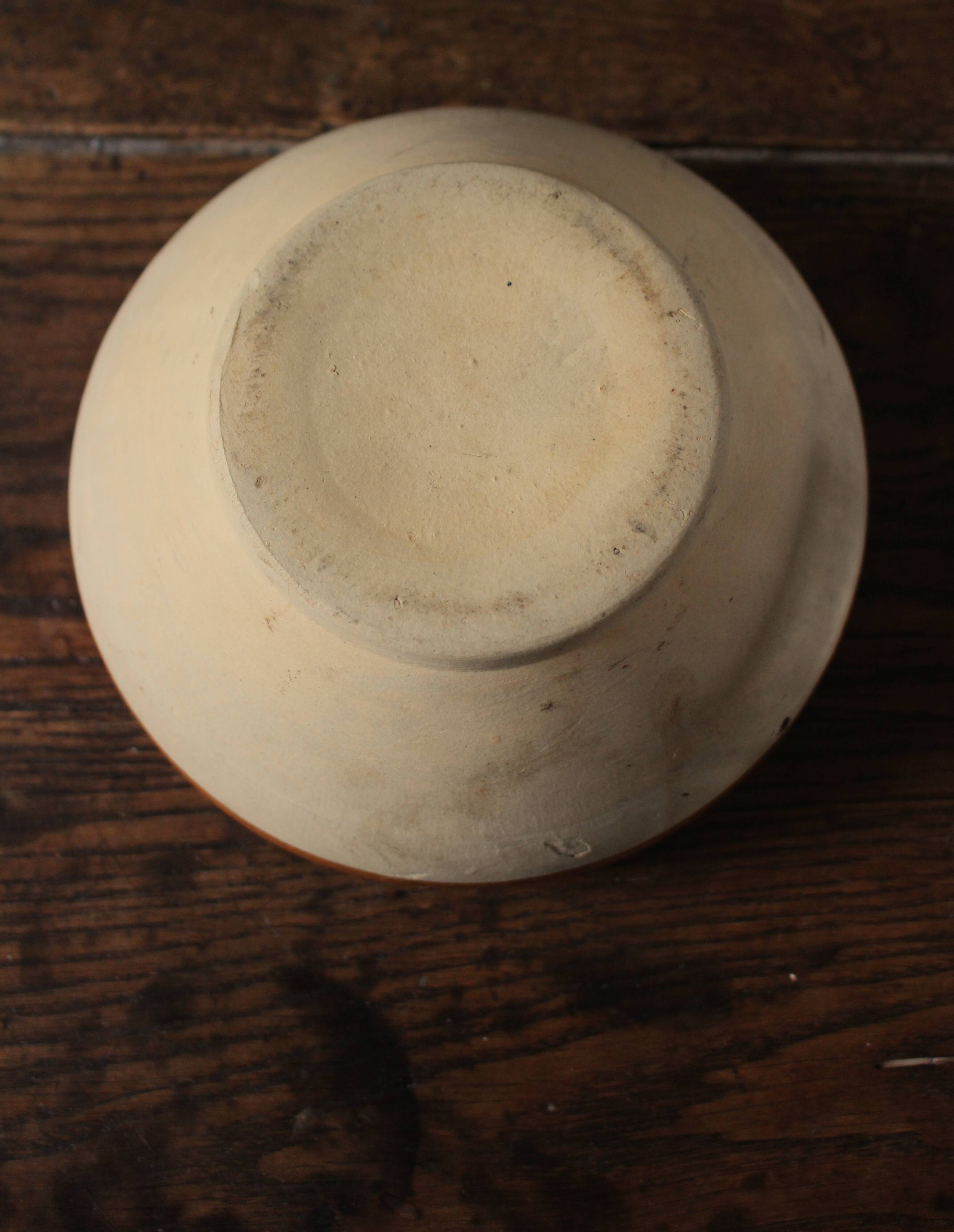 Small vintage two-tone stoneware salad bowl