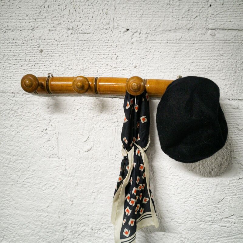 Turned wooden coat rack