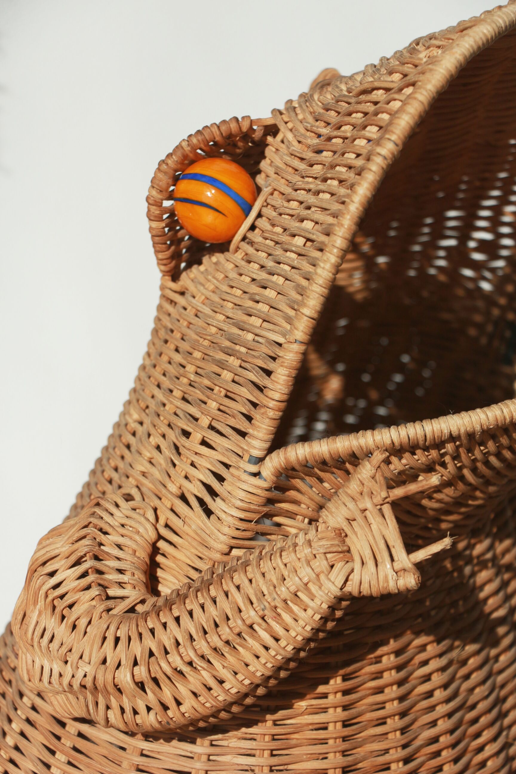 Wicker frog magazine rack by Olivier Cajan