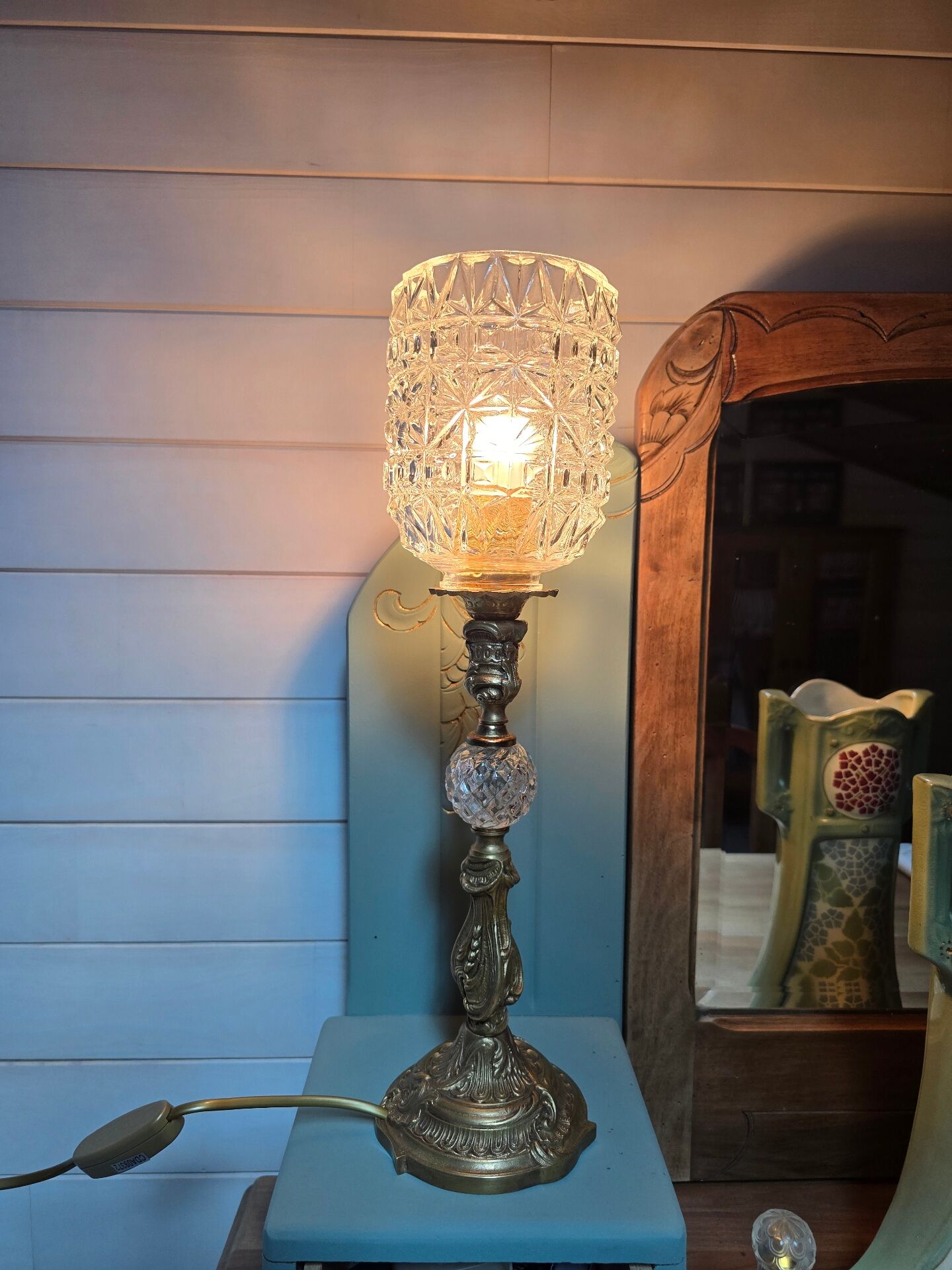 Brass floor lamp with a glass ball, cut glass globe.