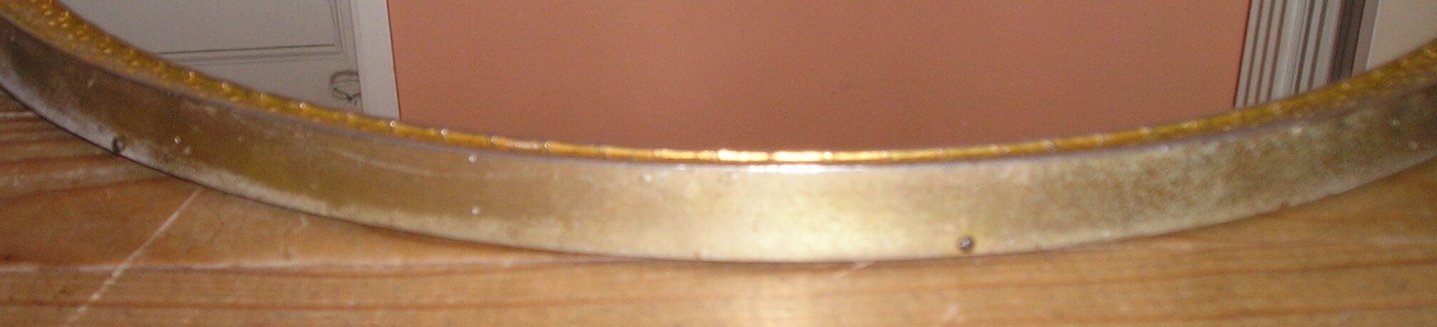 Golden bronze mirror with 55 cm shell