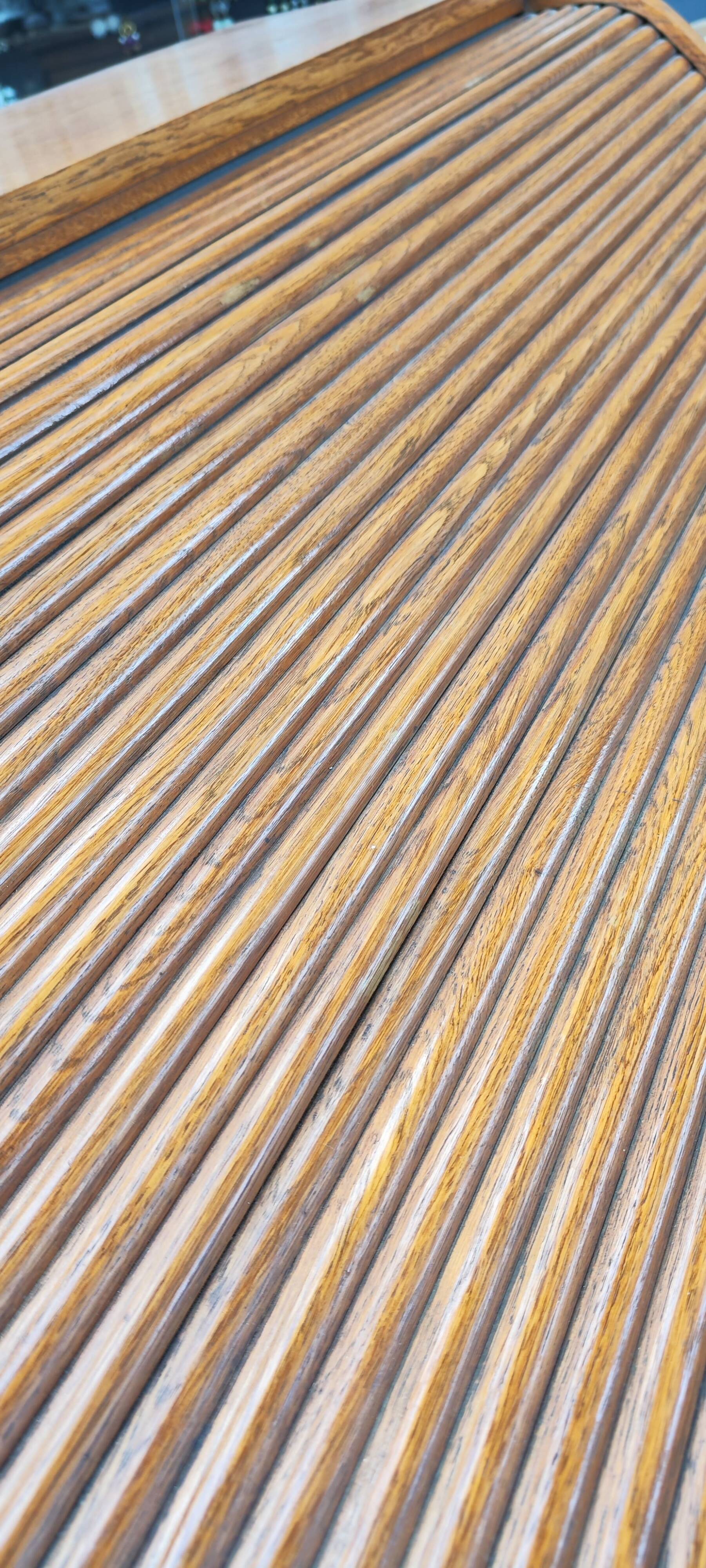 Old American desk in solid oak with S-shaped shutter