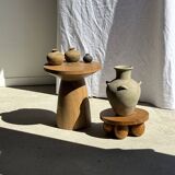 Natural solid mango side table (monoxyle) with conical legs.