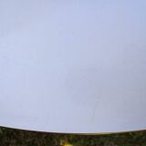 Round table in white formica and wood
