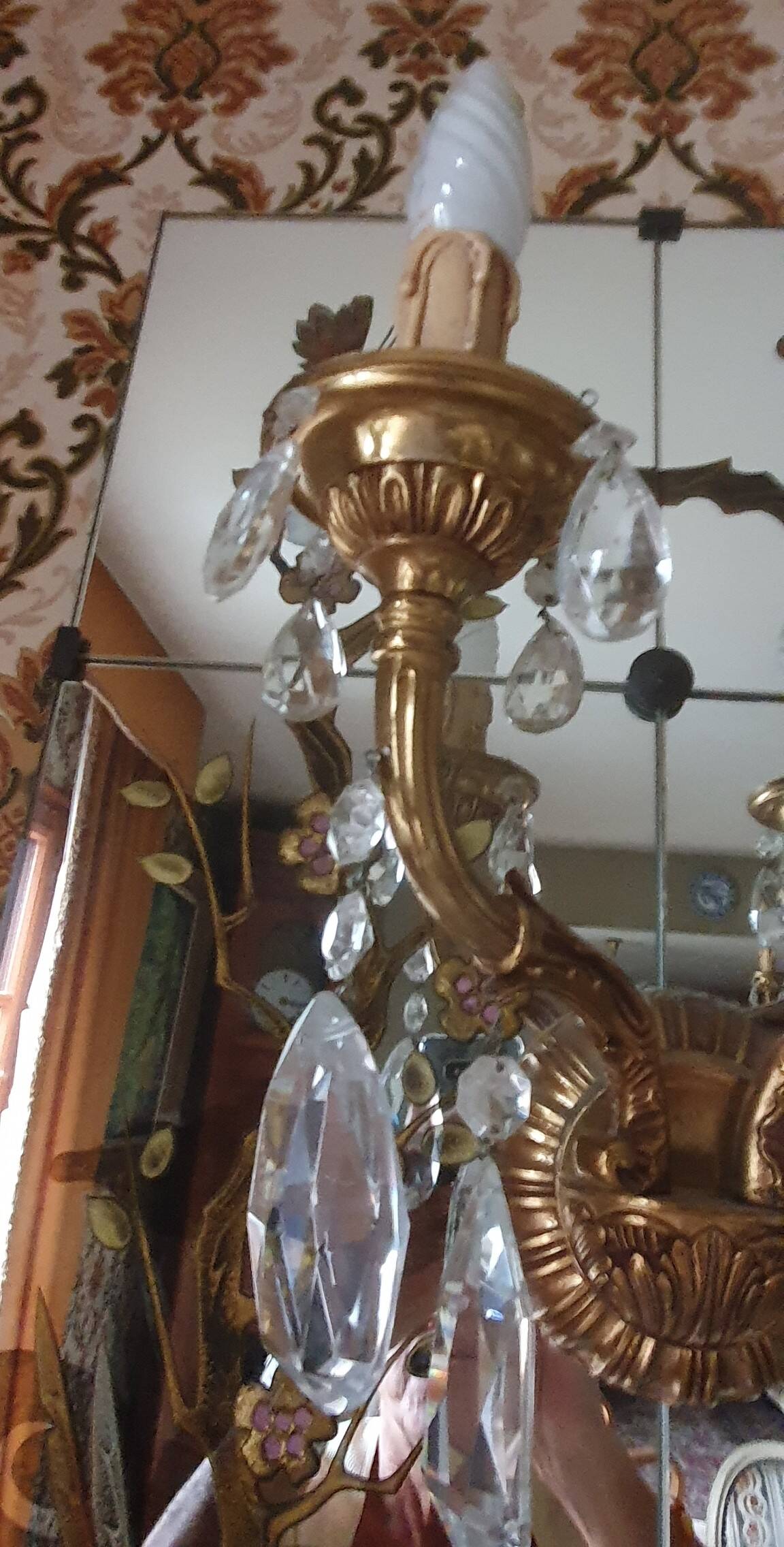 Vintage wall lamp with glass pendants.