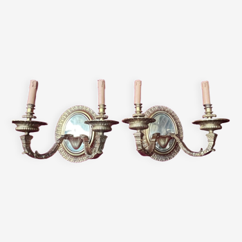 Pair of Louis XVI style solid gilded bronze wall sconces.