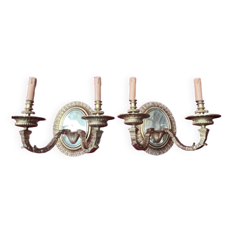 Pair of Louis XVI style solid gilded bronze wall sconces.