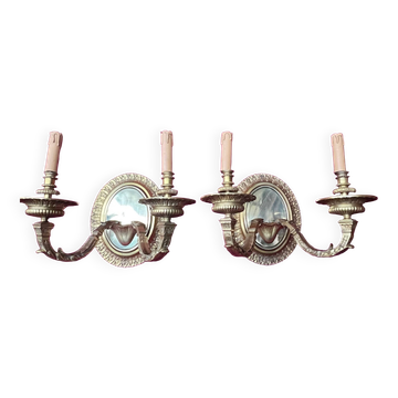 Pair of Louis XVI style solid gilded bronze wall sconces.