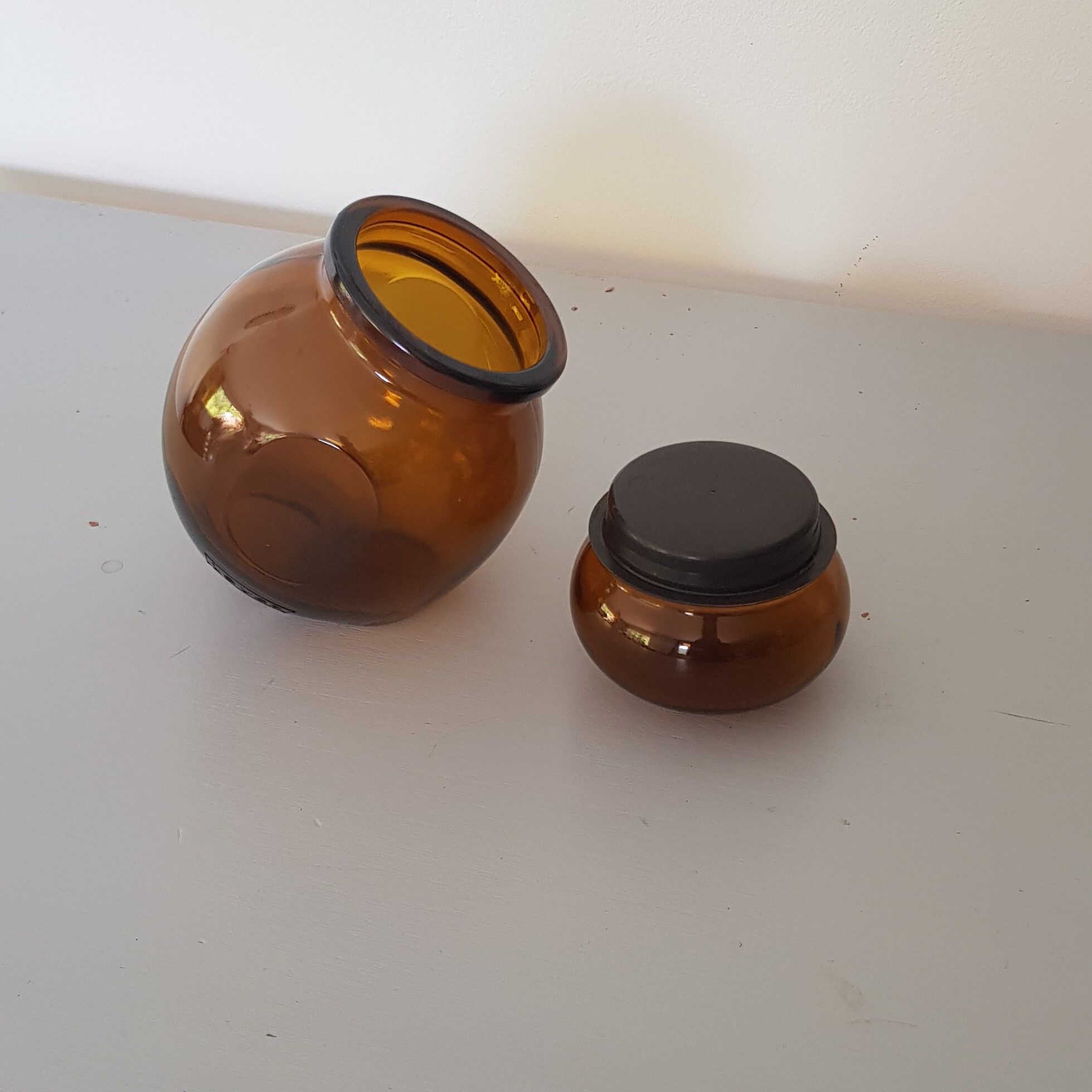 Atypical amber brown glass bottle