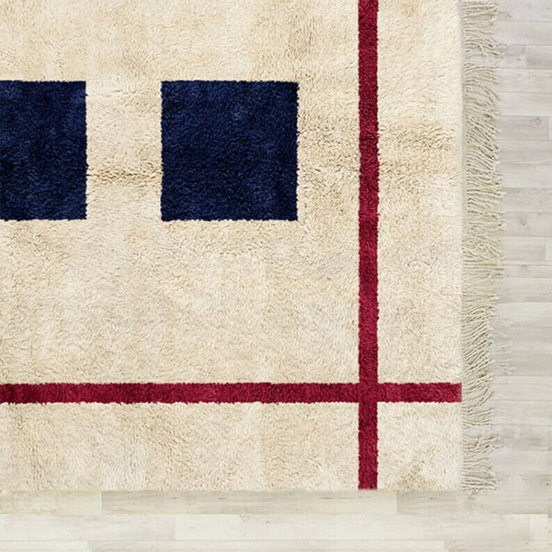 Traditional handmade wool rug in black and white with burgundy 250cmx150cm
