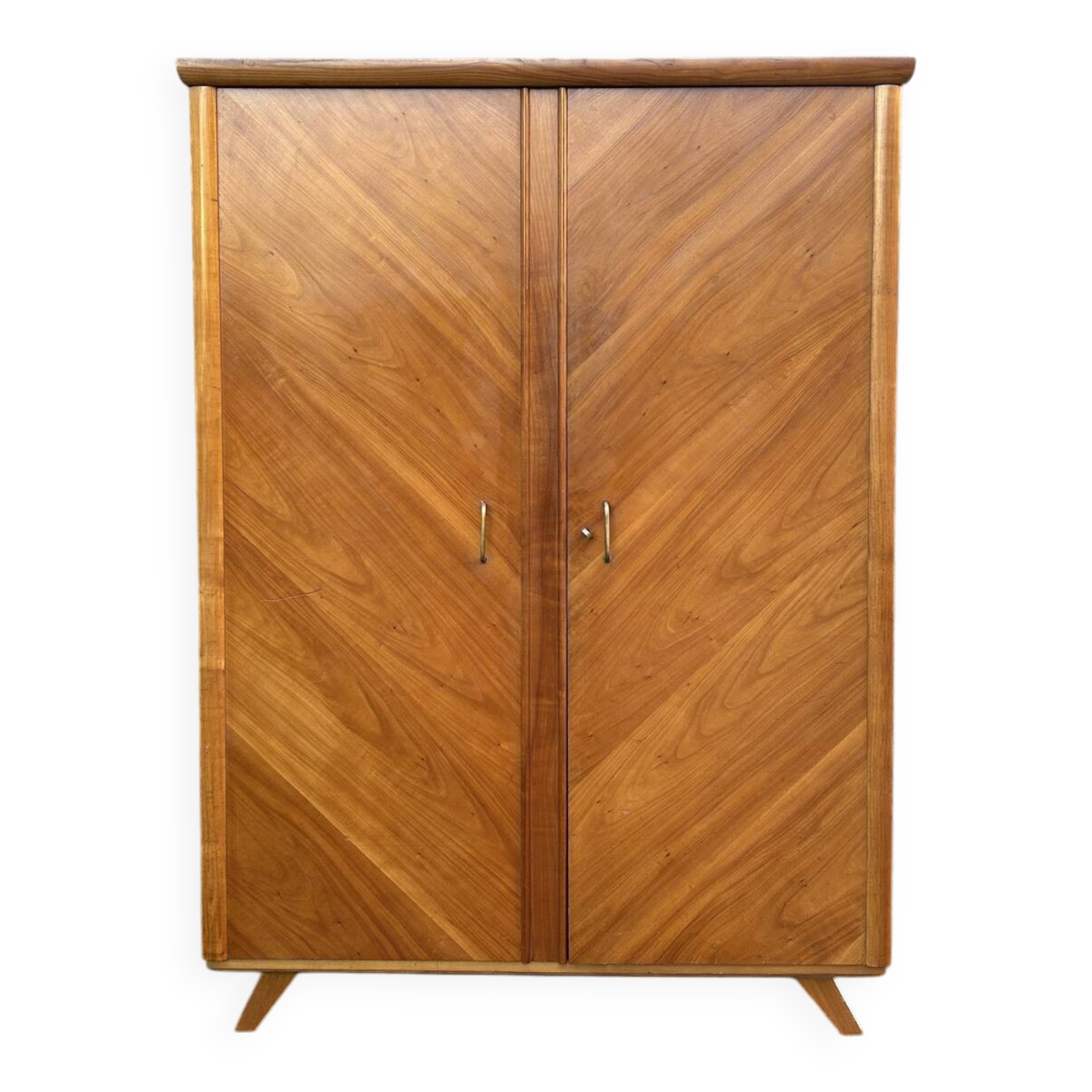Mid-century wardrobe from the 1960s in wood, with a chevron front and tapered legs.