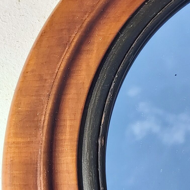 Old wooden round mirror