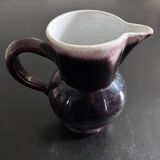 Antique tilted pitcher