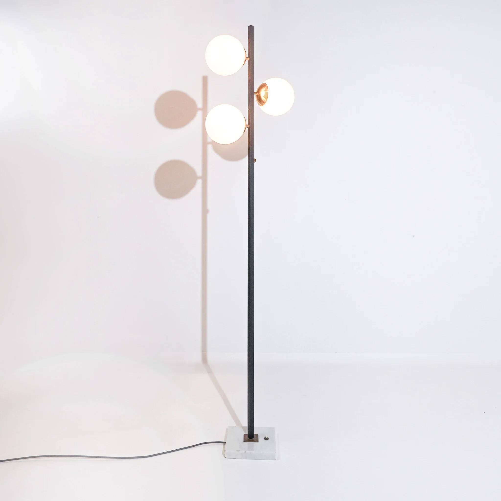 Vintage Italian Stilnovo floor lamp from the mid-century with opaline glass globes and a marble base.