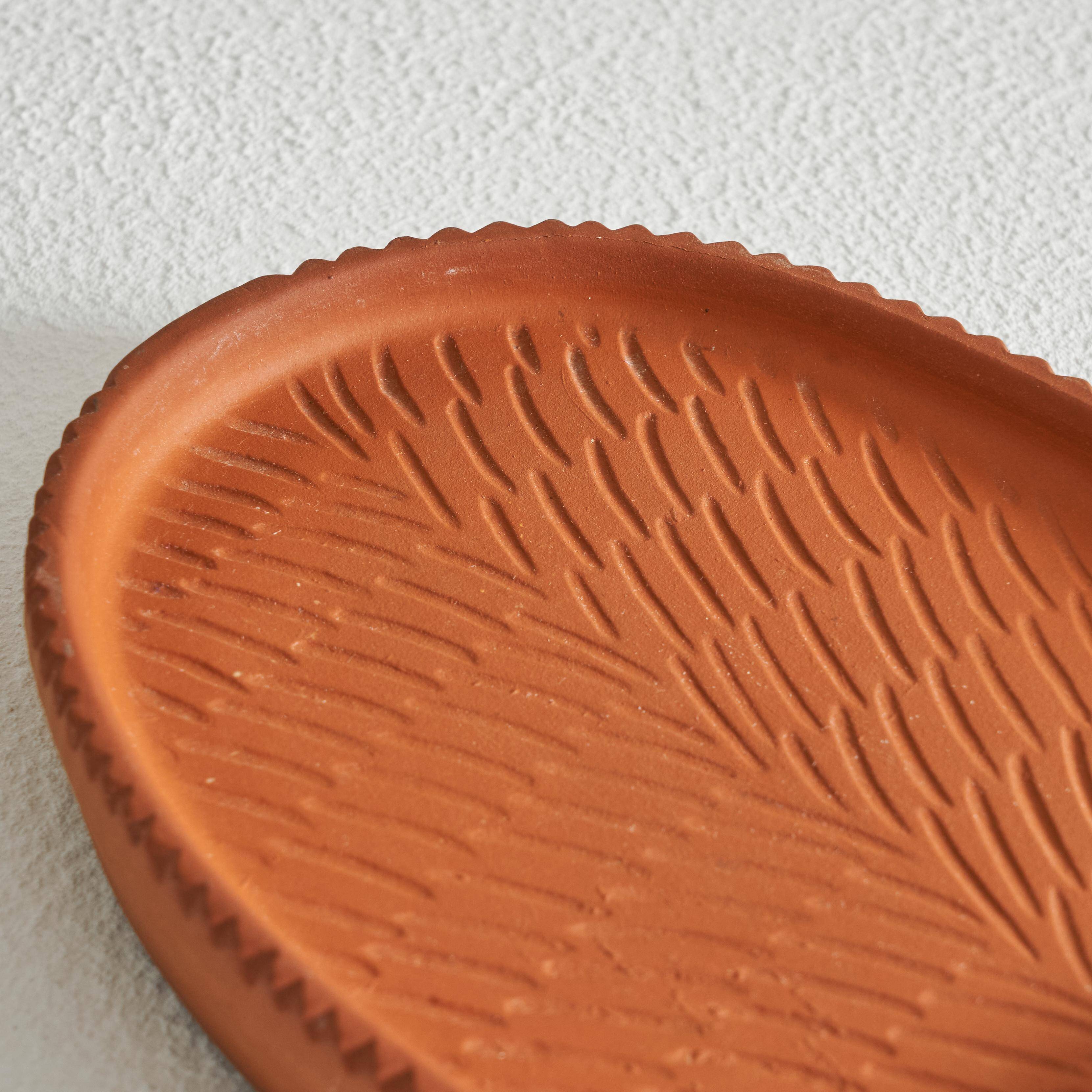 'Igel' plate in terracotta from the mid-20th century