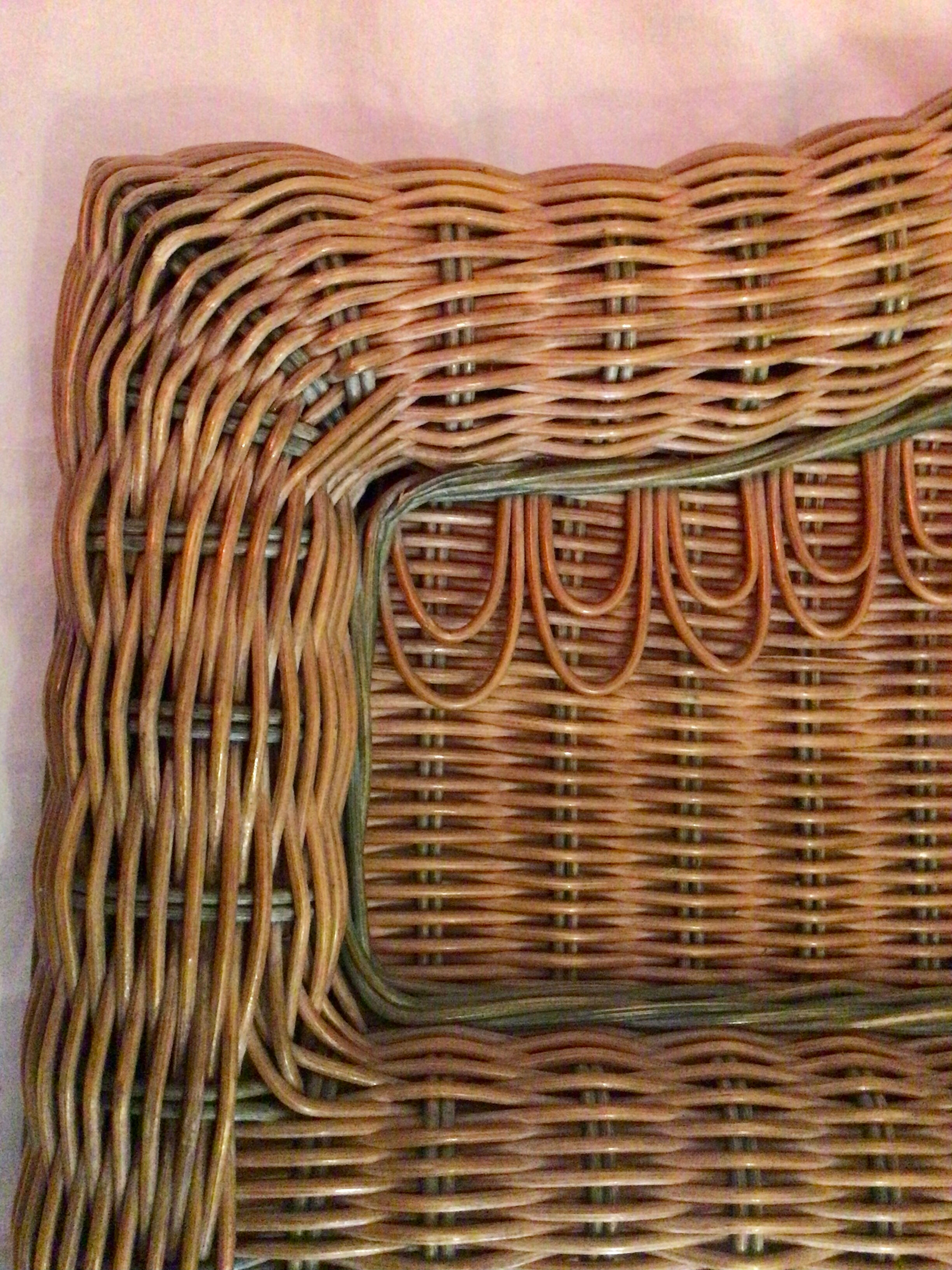 Vintage braided rattan mirror.