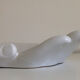 Empty white enamelled ceramic pocket in the shape of a large hand, 1990
