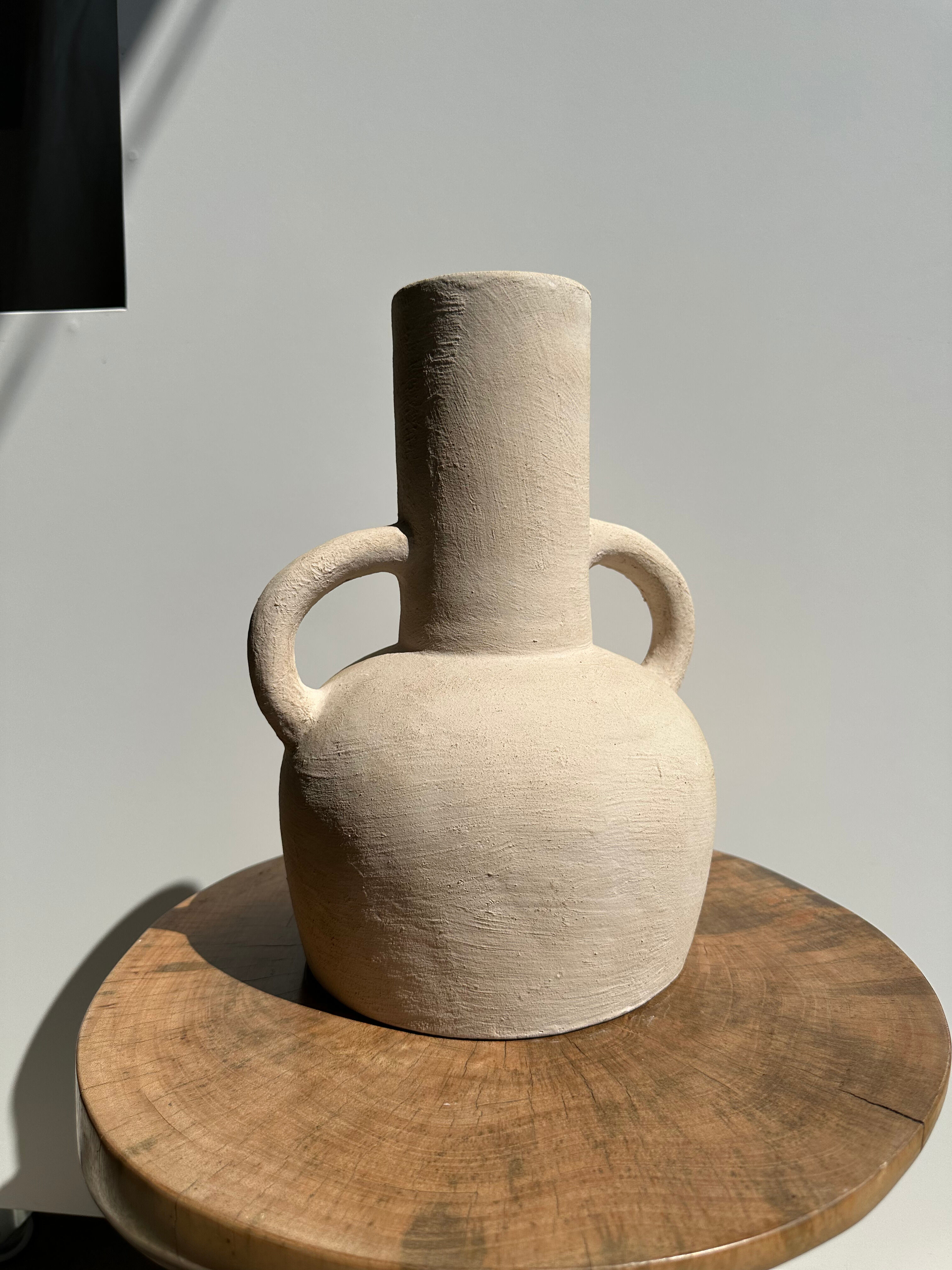 Handmade terracotta vase painted in beige with double handles h:32 d:25