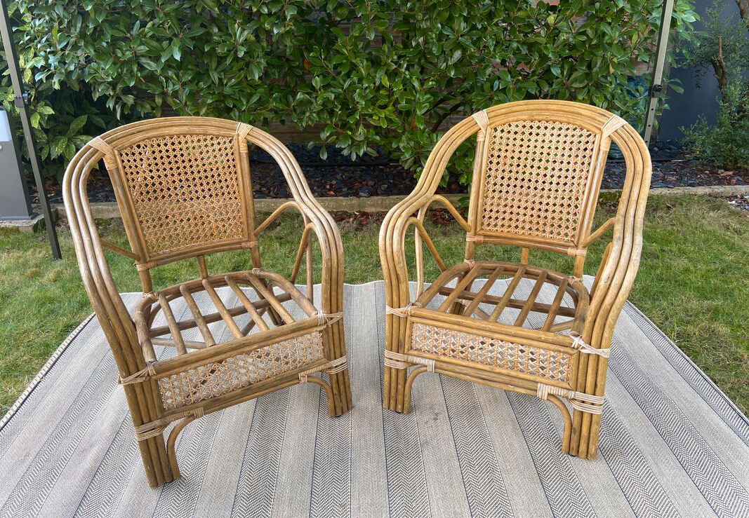 2 vintage armchairs in cannage and bamboo