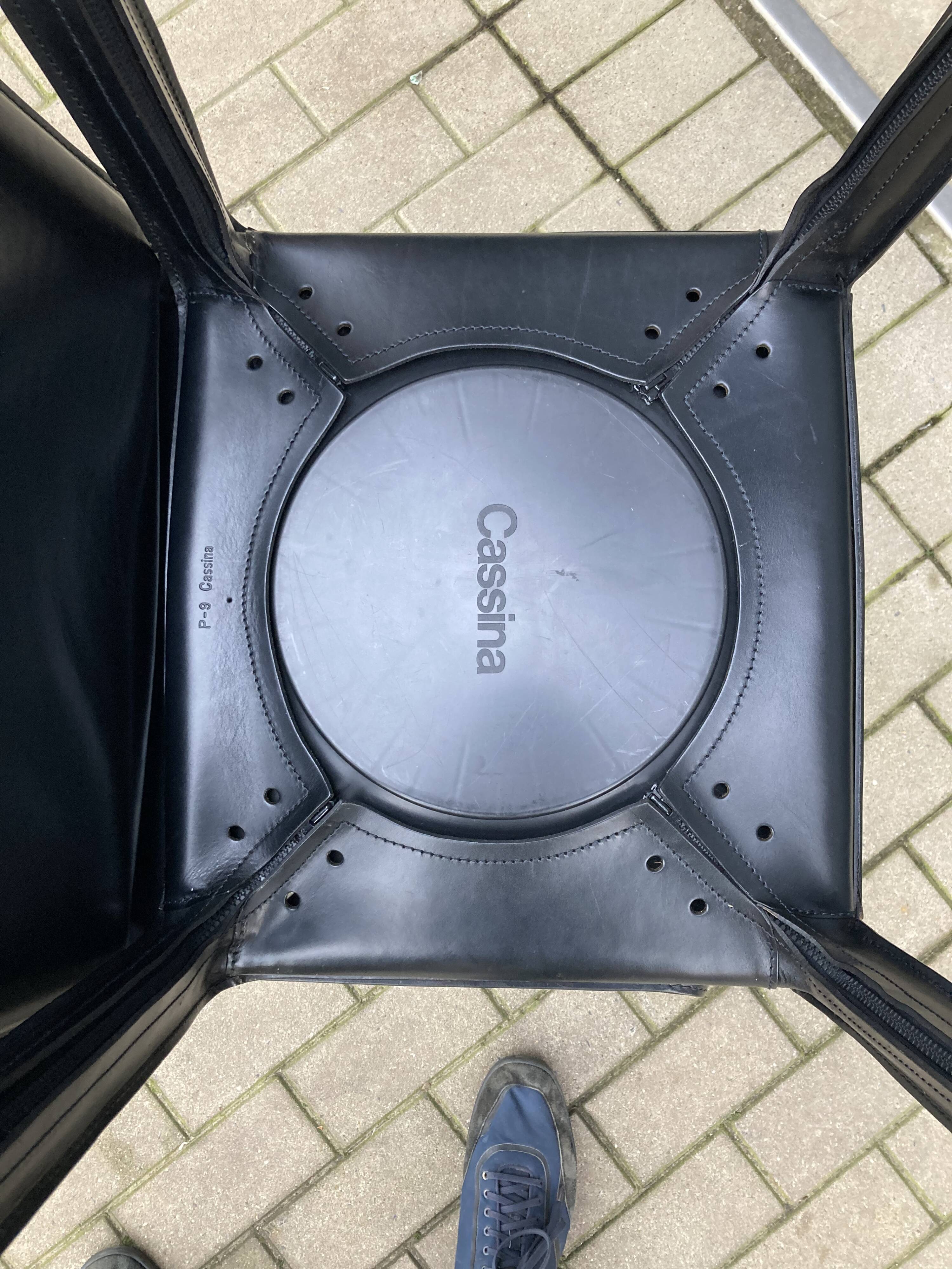 4 black Cassina Cab chairs by Mario Bellini