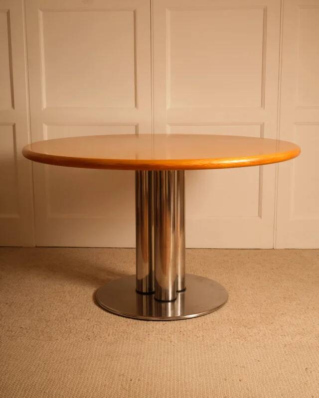 Circular dining table