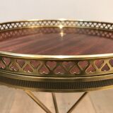 Round brass and mahogany sofa end from Jansen