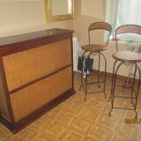 Exotic bar and wrought iron stools
