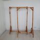 Two vintage bamboo coat racks