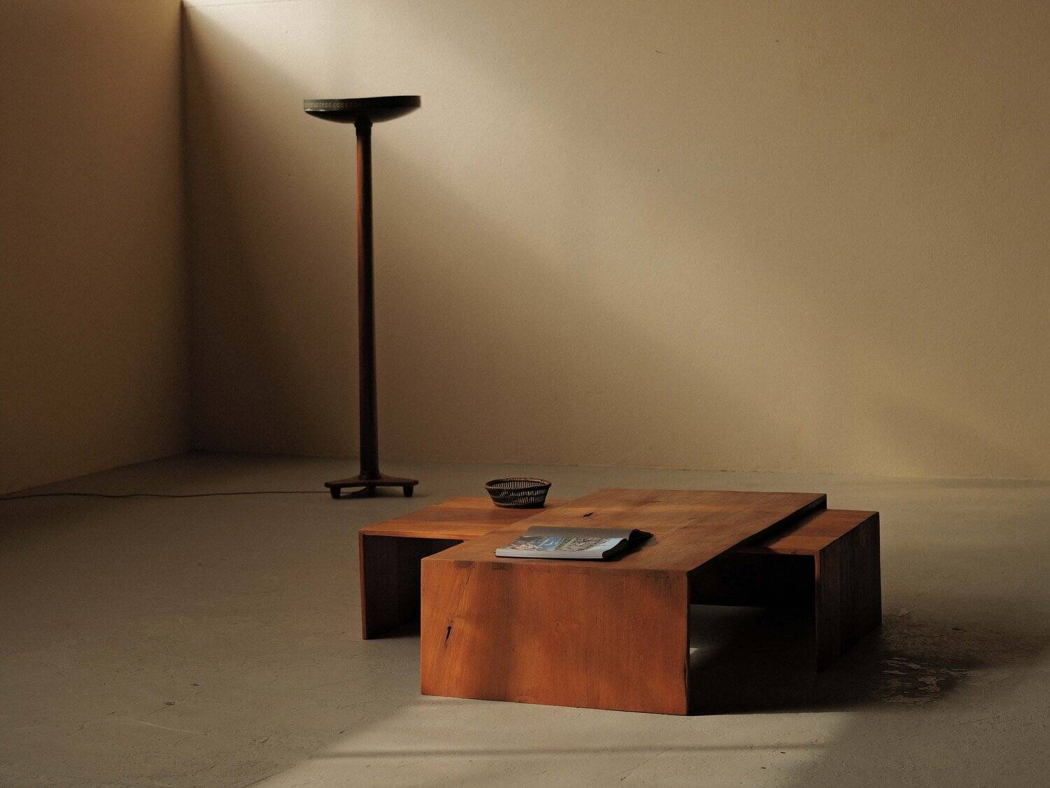 Pair of nesting coffee tables in solid wood, around 1980.