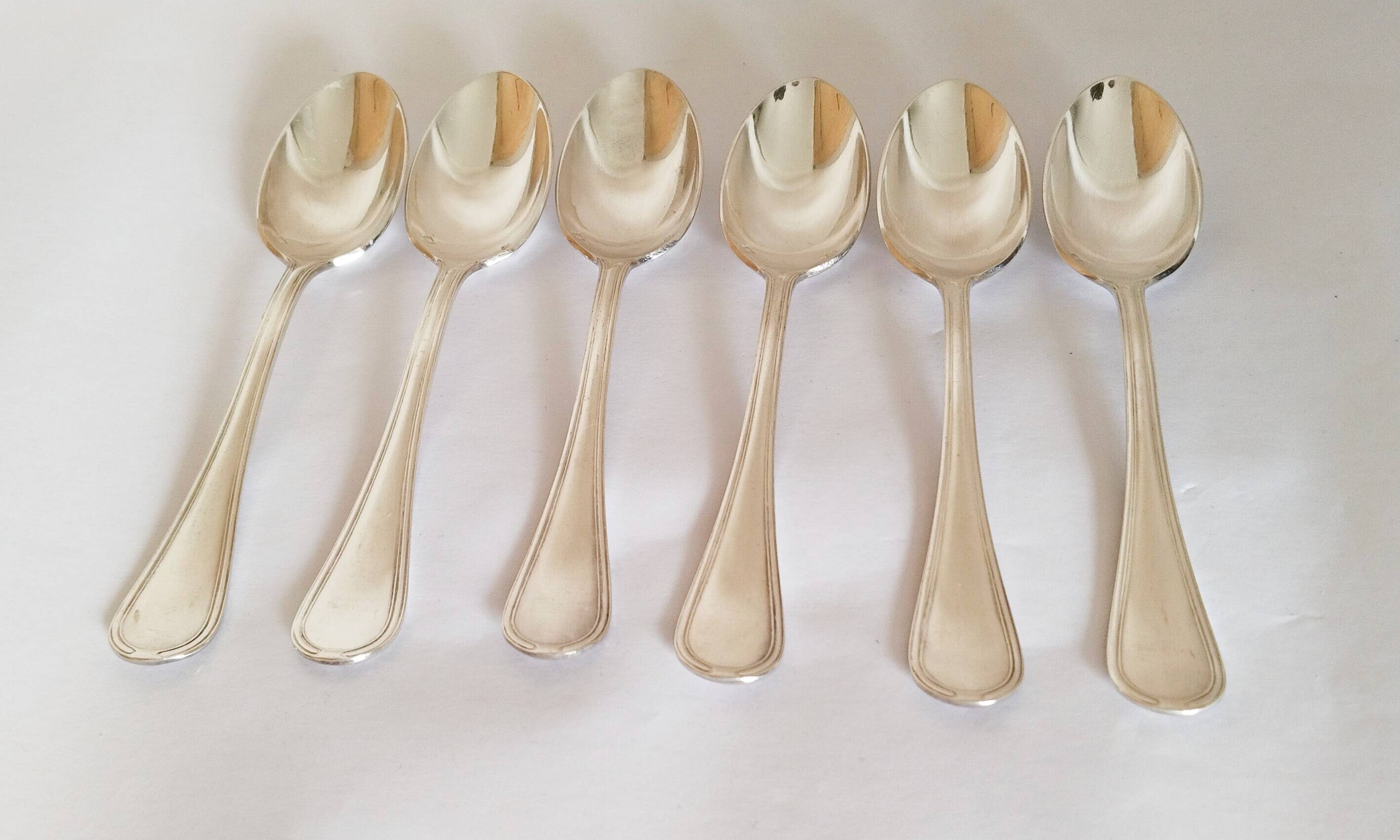 Dessert spoons, silver teaspoons