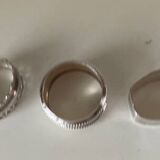 Trio of silver metal napkin rings
