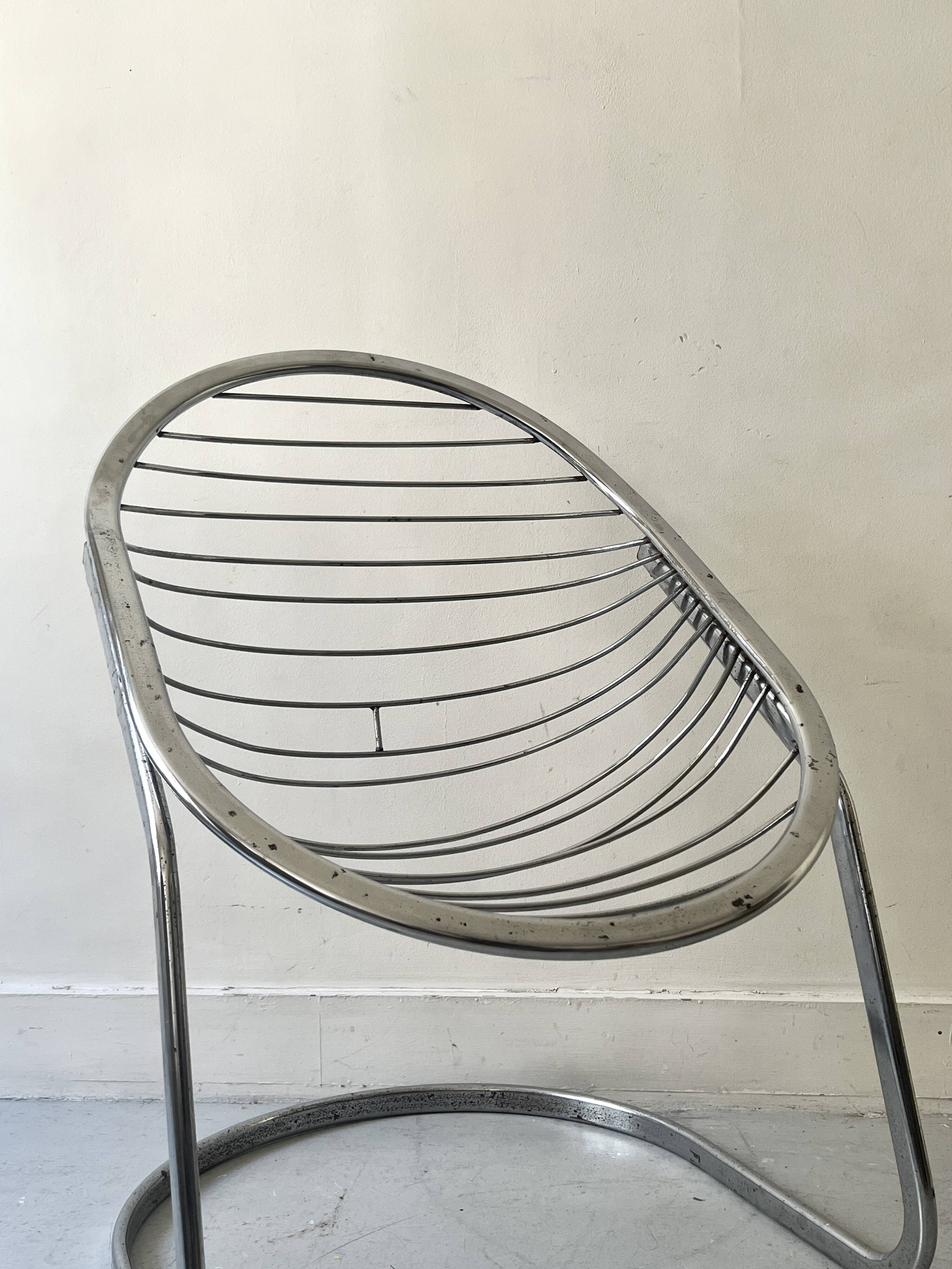 Chromed metal Egg armchair by Gastone Rinaldi, 1970s design chair.