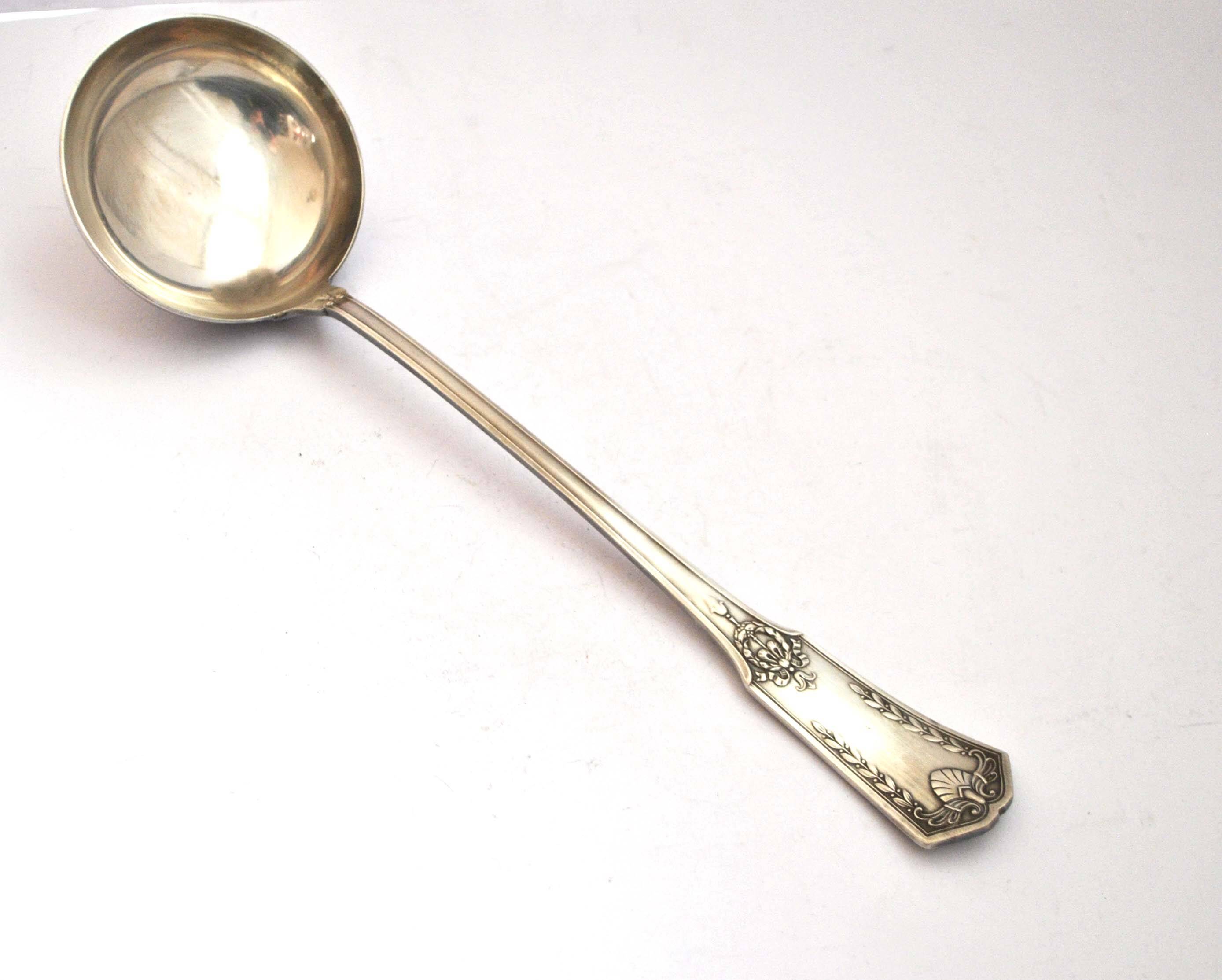 Empire ladle in silver metal SFAM - "Sans embarrass" model with winged shell laurel crown
