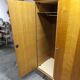 French wardrobe with tapered legs, 3 doors, 1 mirror (27*130), and 1 drawer.