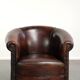 Vintage sheepskin club armchair with beautiful colours and a subtle size
