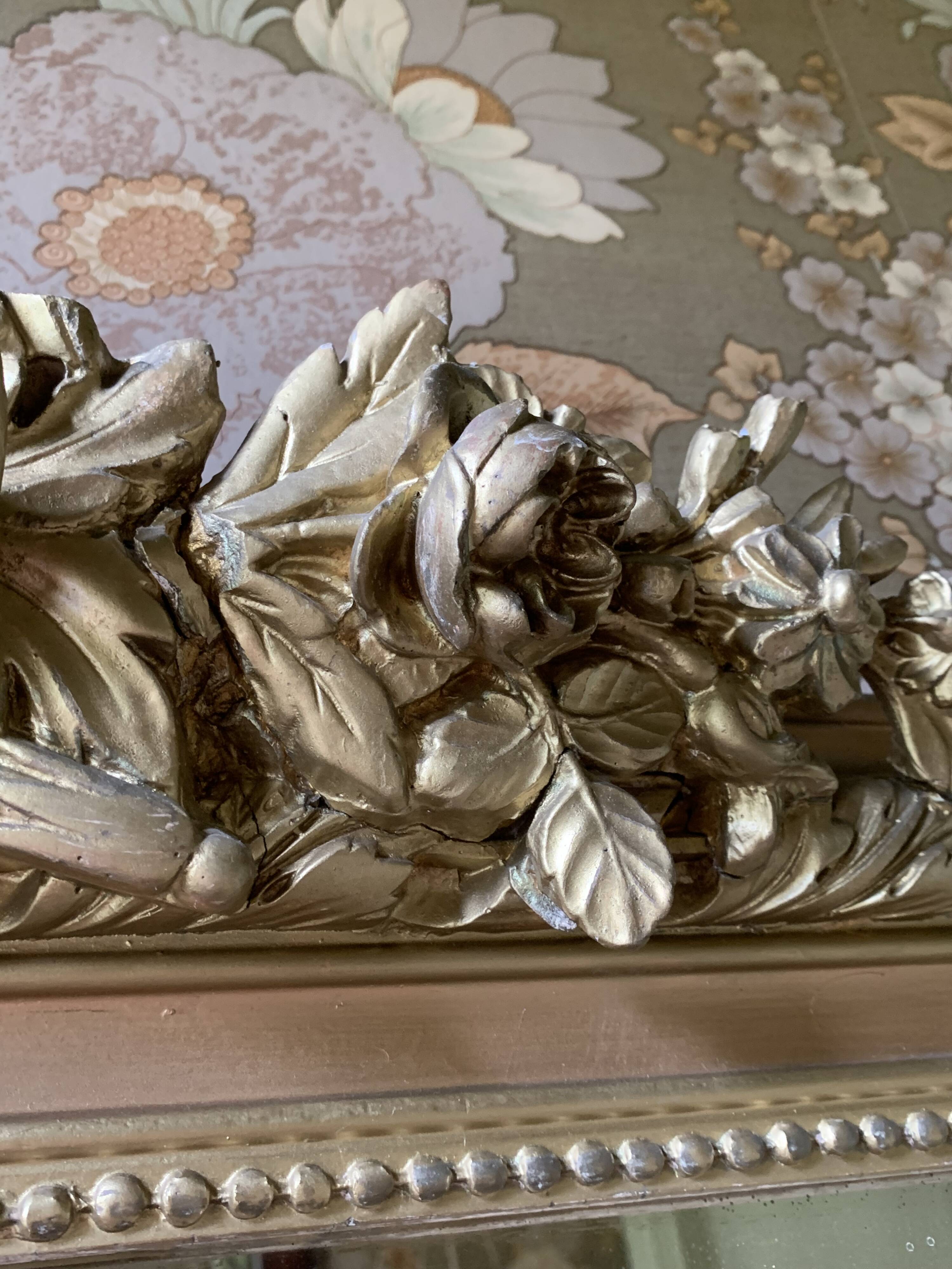 Gilded wooden fireplace mirror with pediment