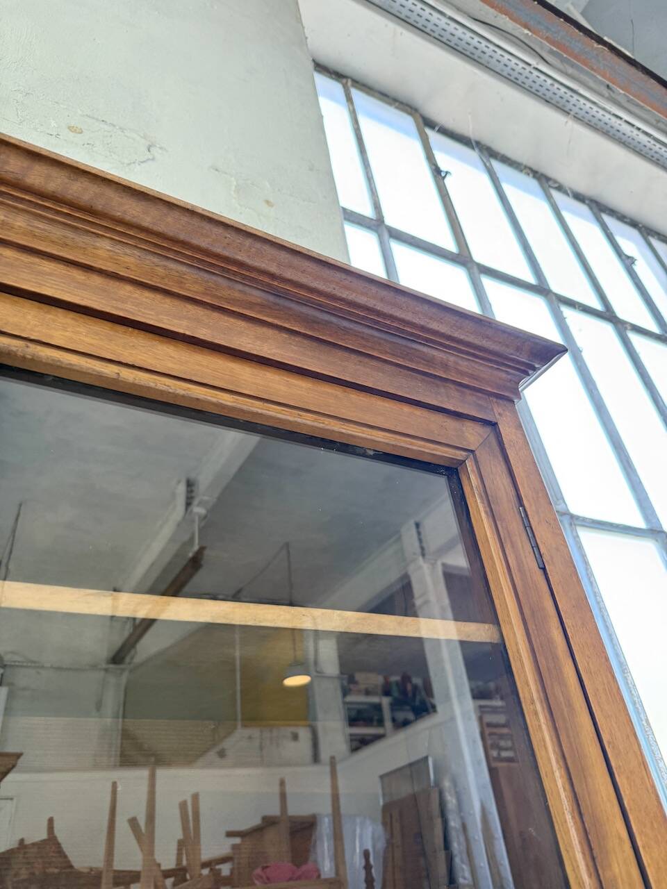 Glass-fronted walnut library 1900