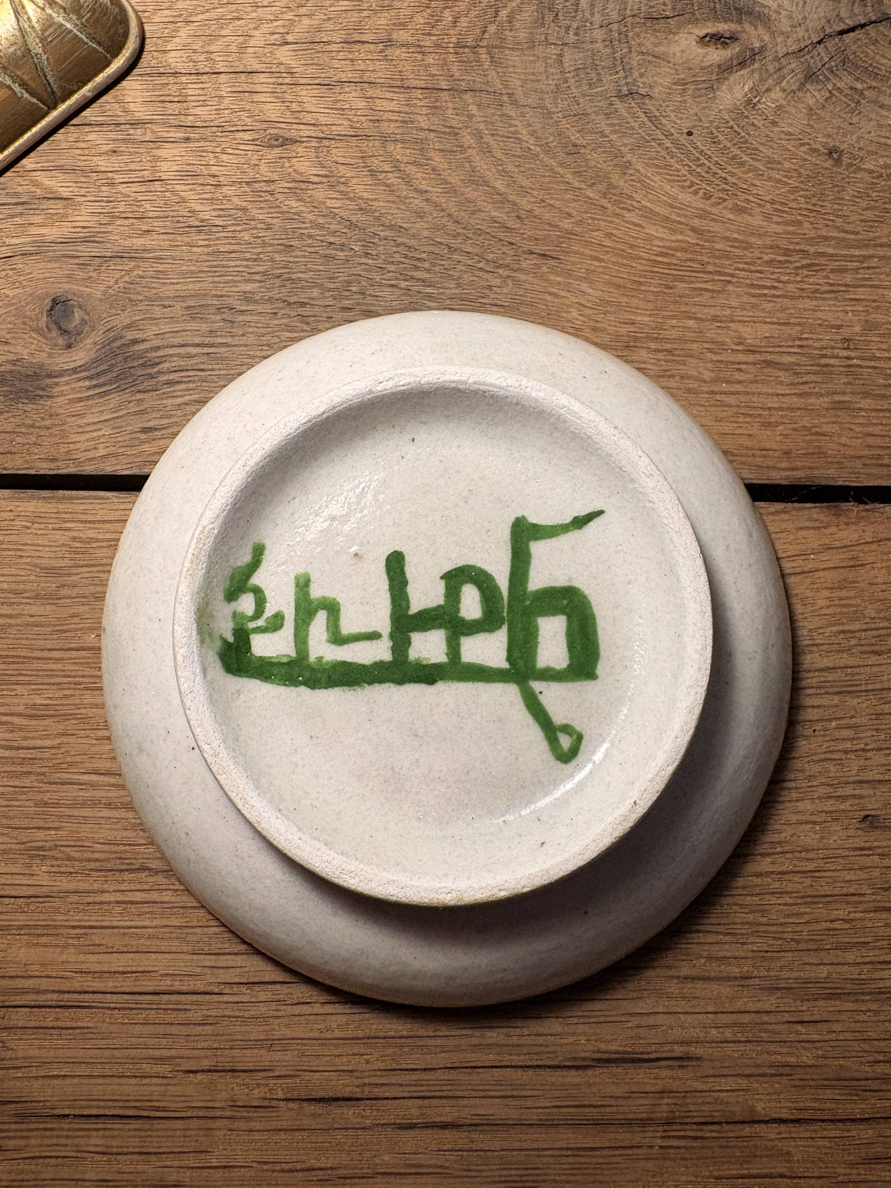 Handcrafted ceramic plate – bird design – signed