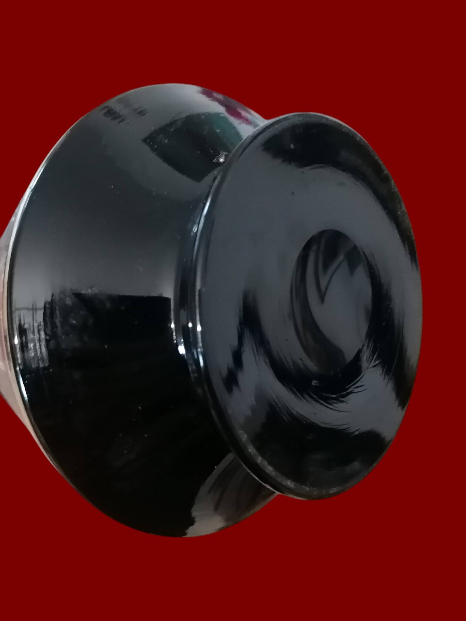 Antique black enameled glass vase