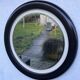 Round vintage mirror in brown resin – 1970s modernist design