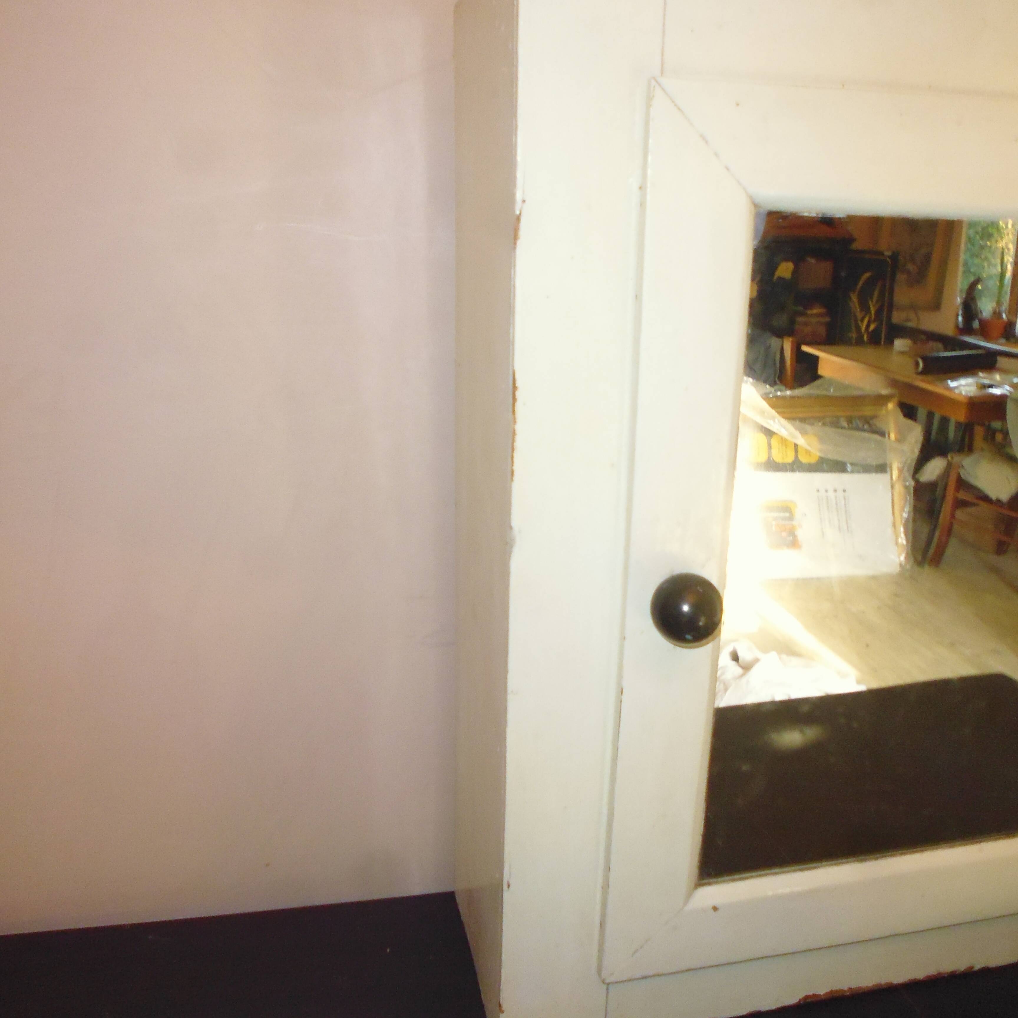 Former wooden medicine cabinet and mirror