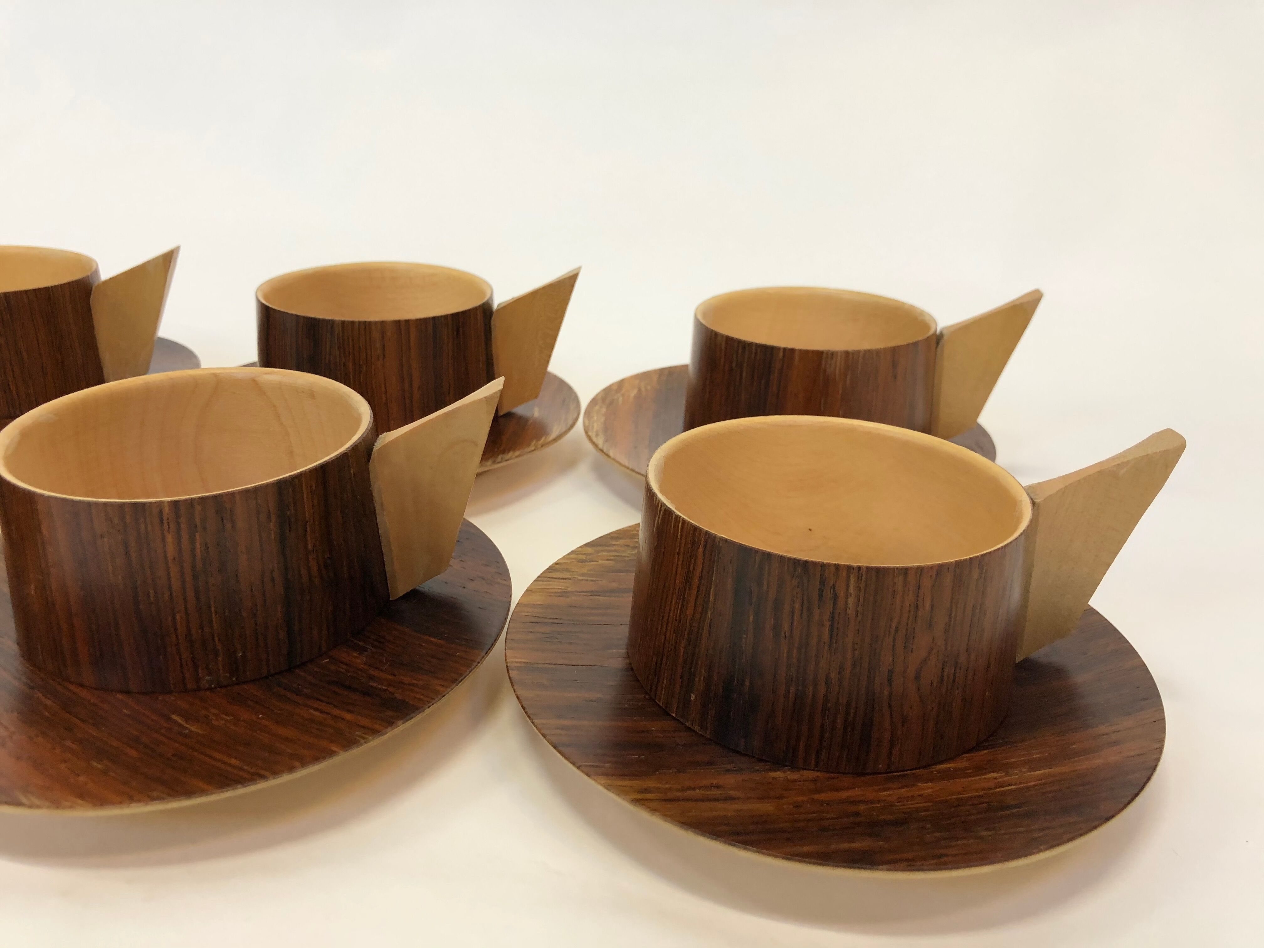 Vintage wooden cups and saucers in teak