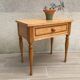 Formica and vintage wood bedside table