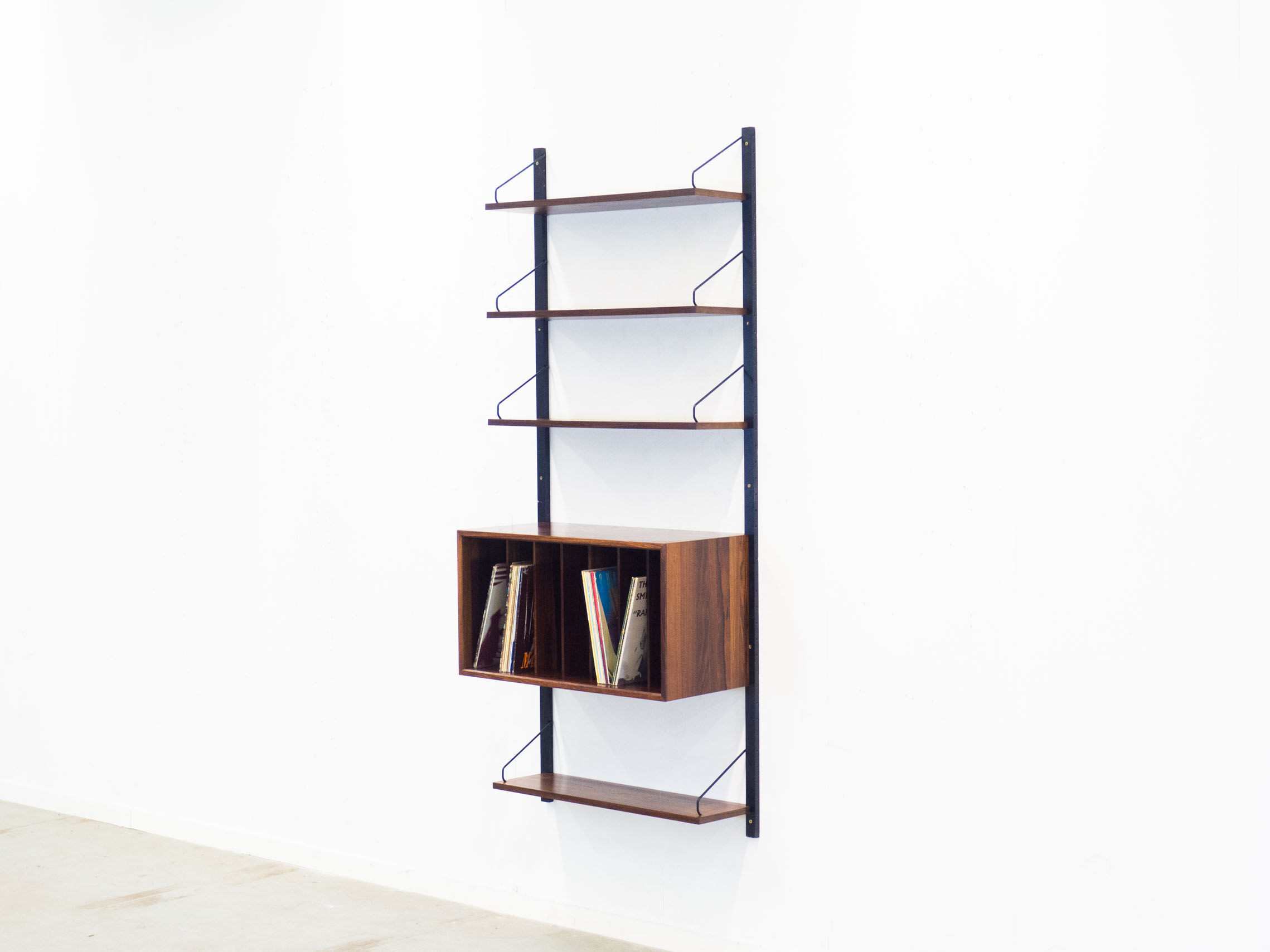 Royal System rosewood wall unit by Poul Cadovius