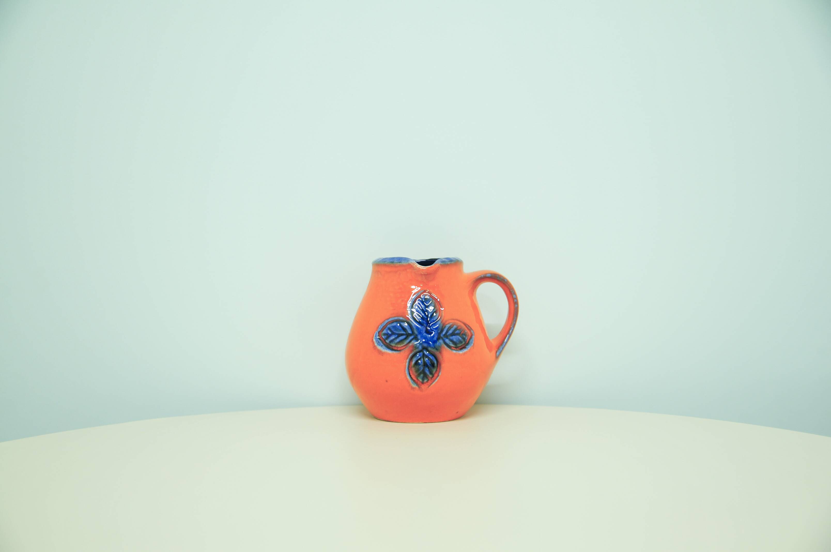 Vintage orange and blue flower west germany jug carstens