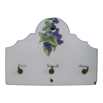 Vintage enamelled tea towel hanger