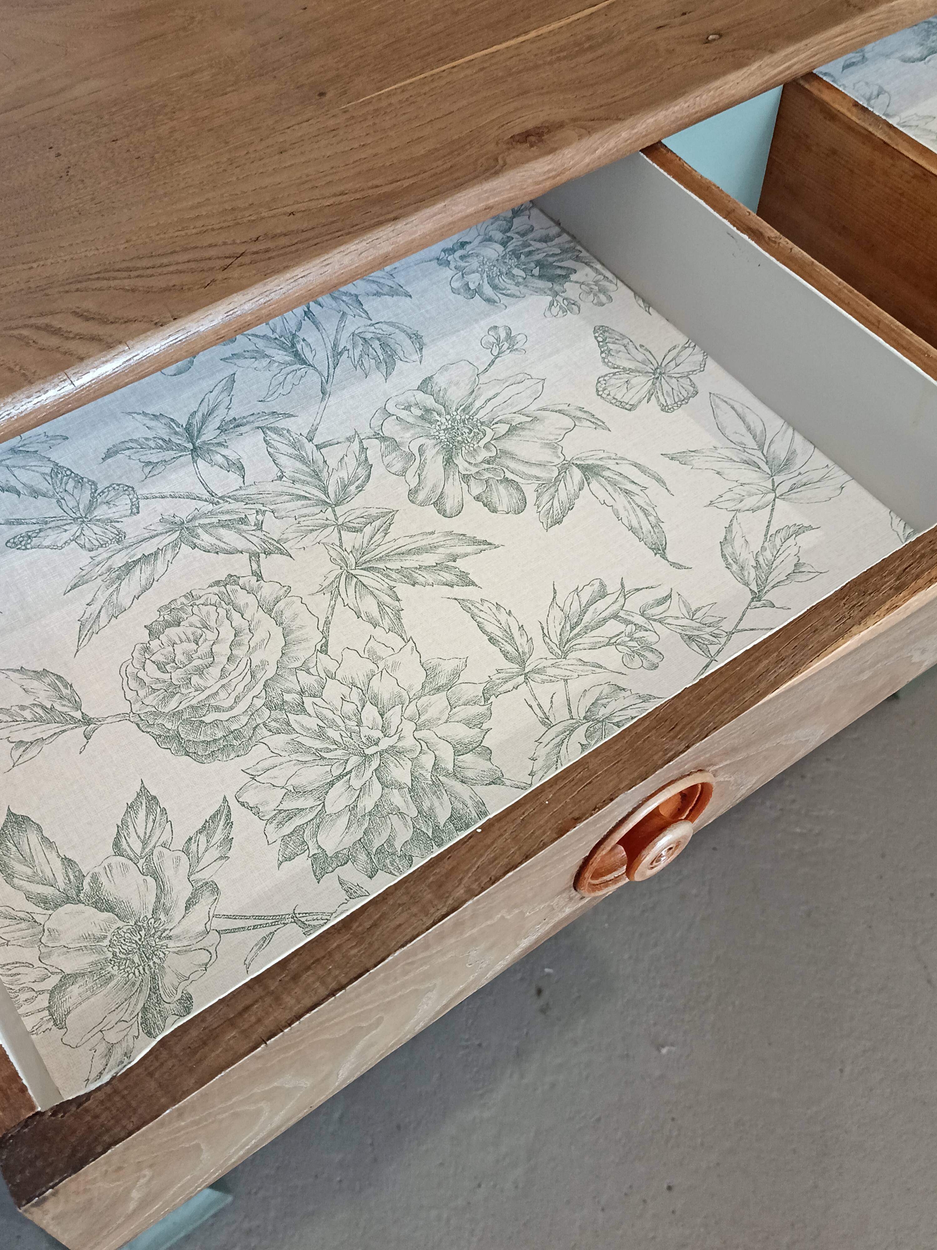 Buffet made of natural wood and bronze green.