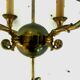 Empire-style chandelier has double patina